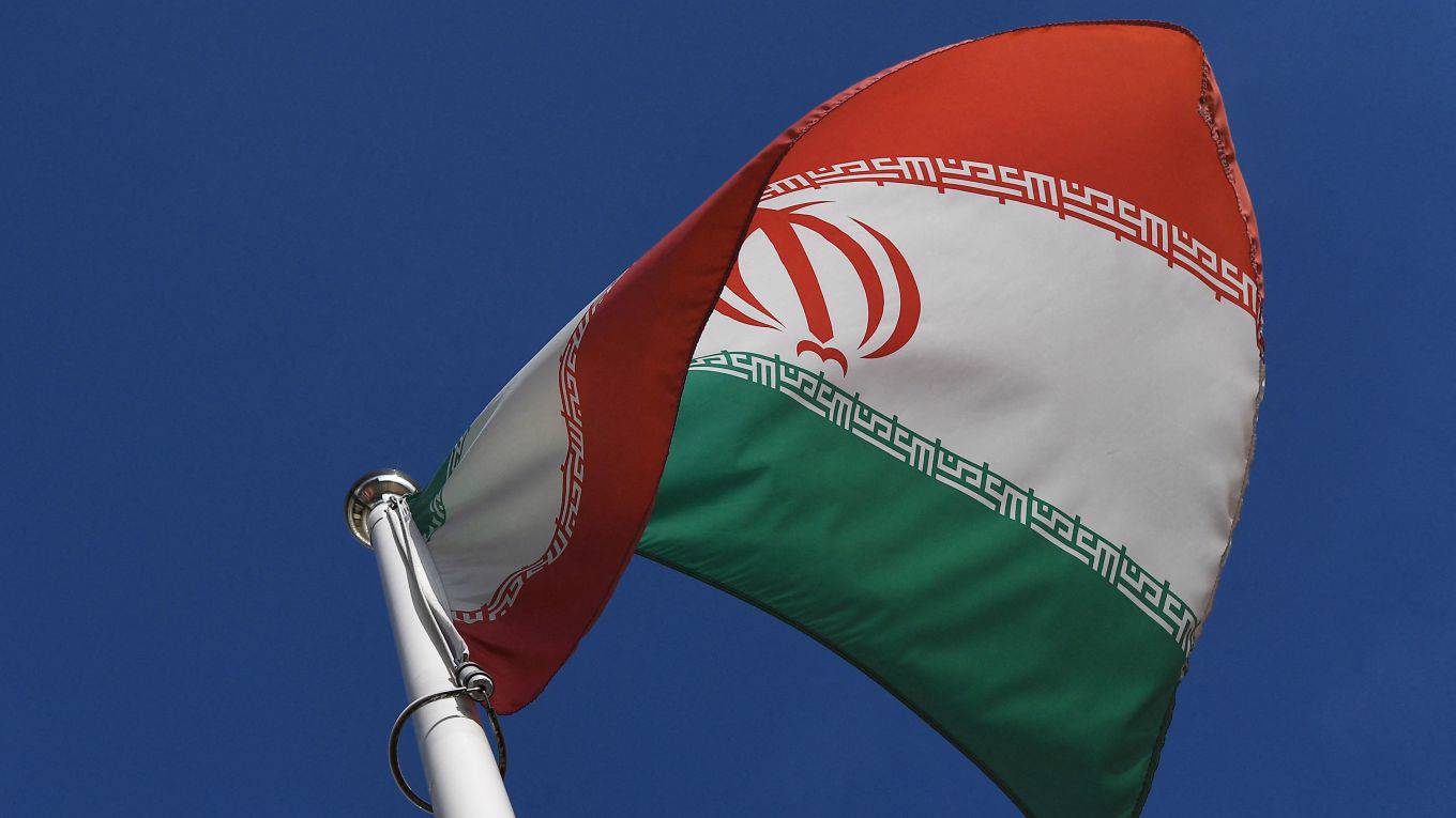 benami173_JOE KLAMARAFP via Getty Images_iran flag