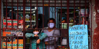ocampo49_RONALDO SCHEMIDTAFP via Getty Images_latinamericacovidpoverty