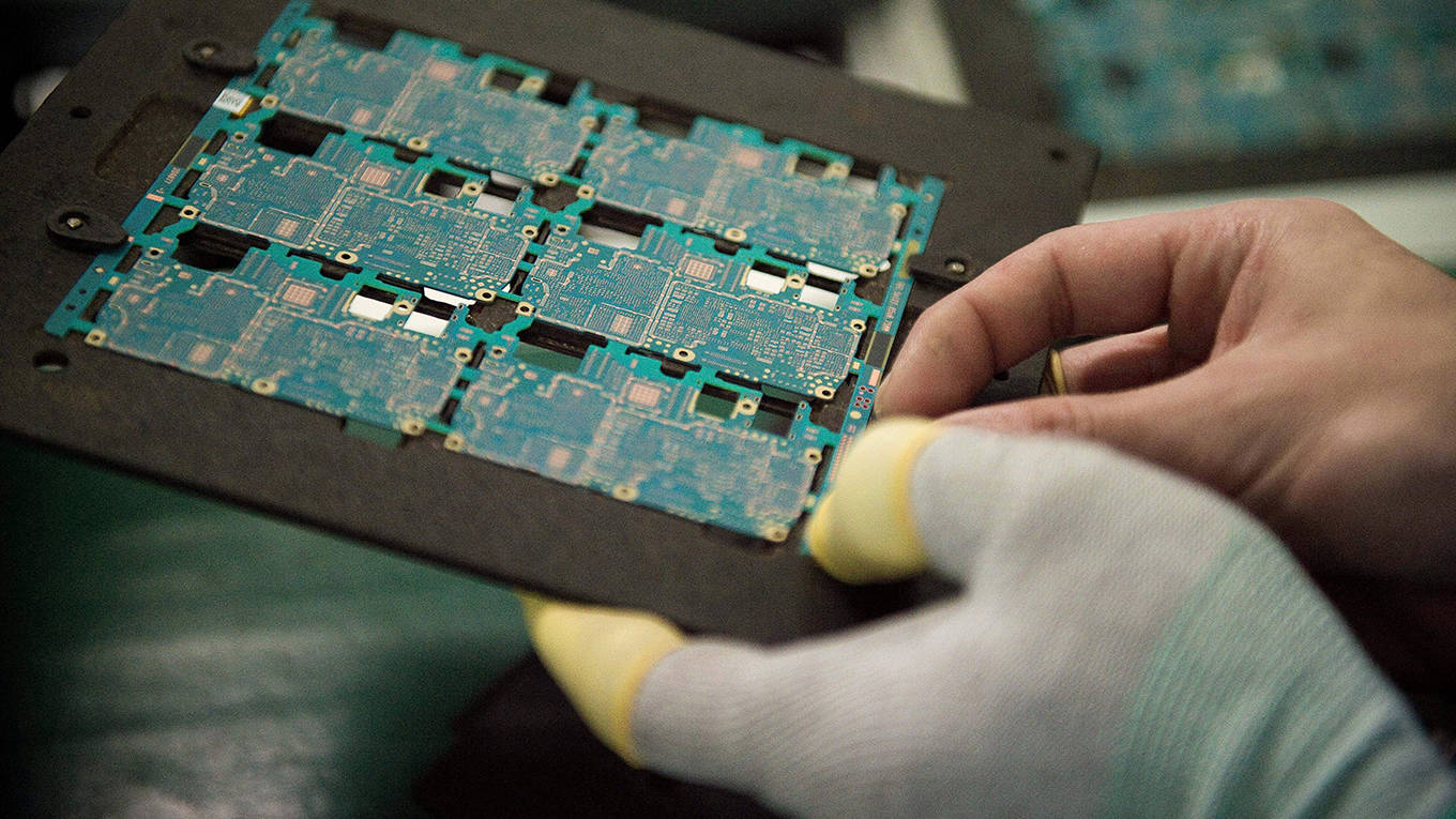 spence150_NICOLAS ASFOURIAFP via Getty Images_technologymanufacturing