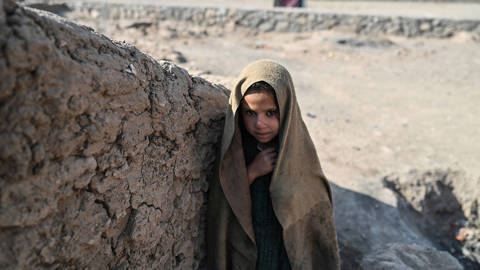brown82_HECTOR RETAMALAFP via Getty Images)_afghanistanchildpoverty
