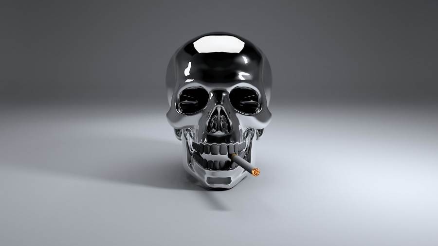 Chrome skull with a cigarette.