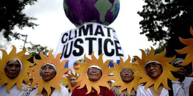 krishnan3_NOEL CELISAFP via Getty Images_climate protest asia