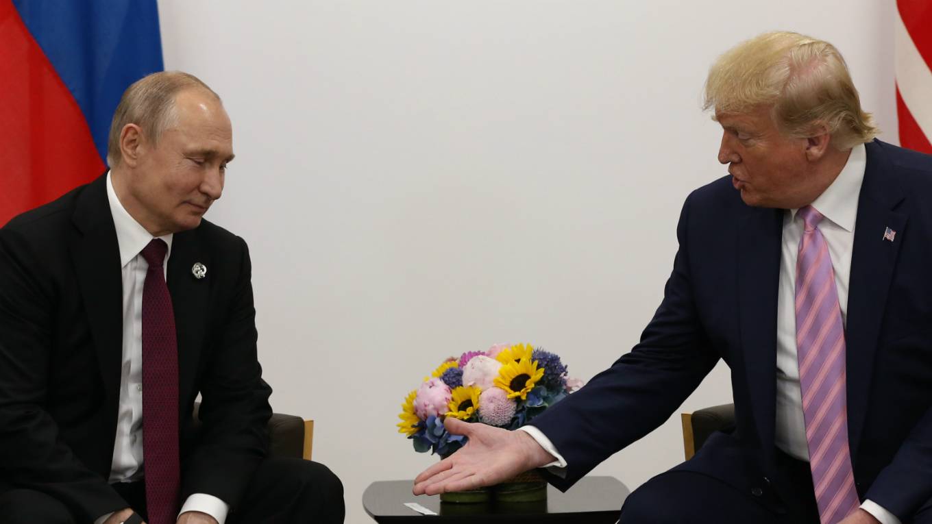 holmes7_putin_trump_Mikhail_Svetlov_Getty_Images1152460291