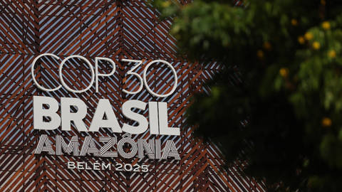 COP30 logo displayed on the central building in Belém, Brazil, with modern signage and structural details visible.