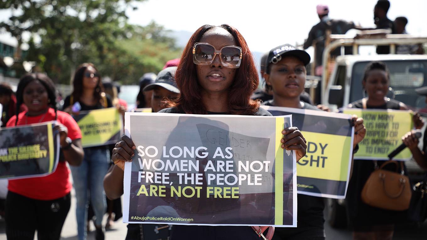 emmanuel1_KOLASULAIMONAFPGettyImages_womanprotestfreewomensign
