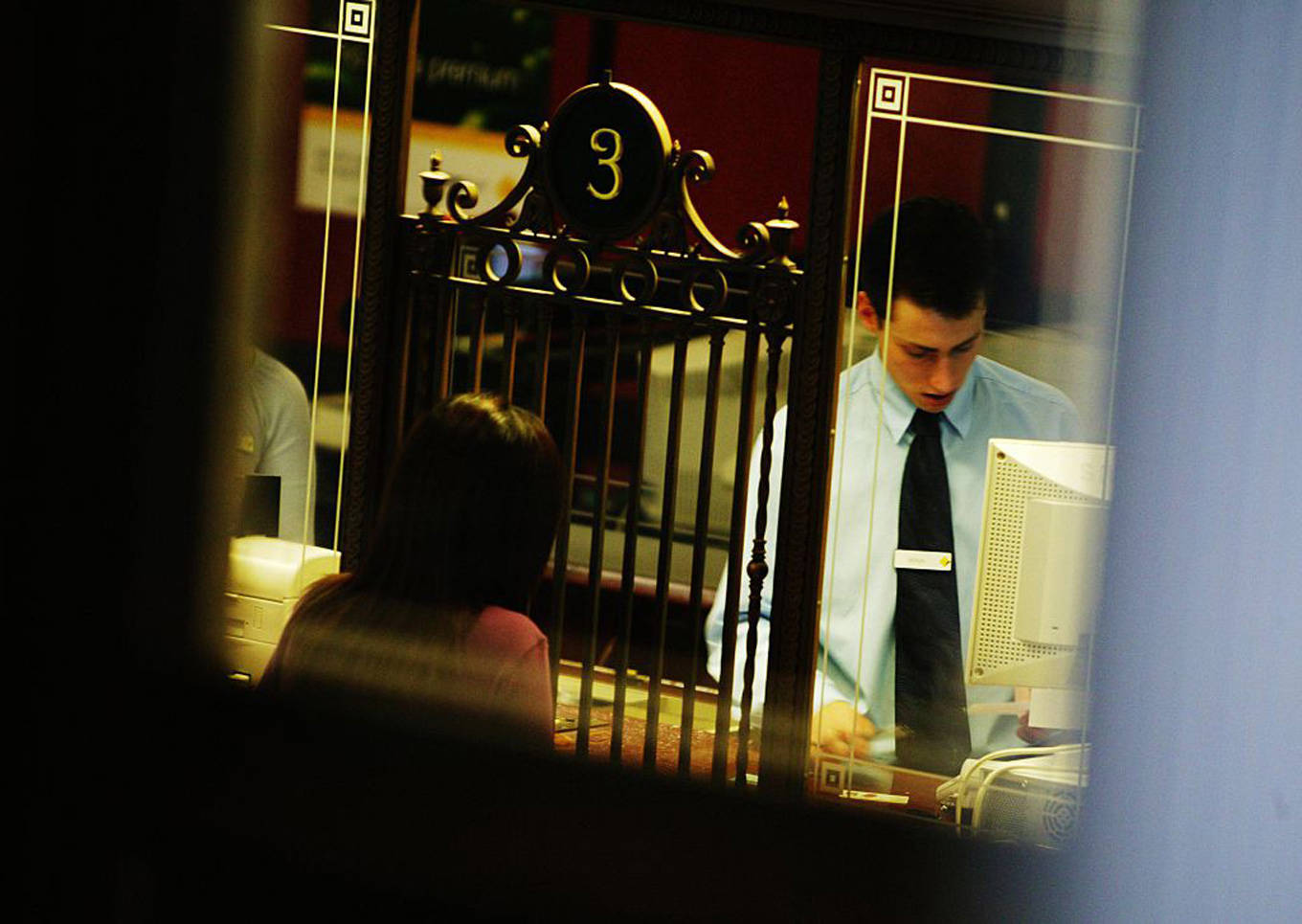 Woman at bank teller