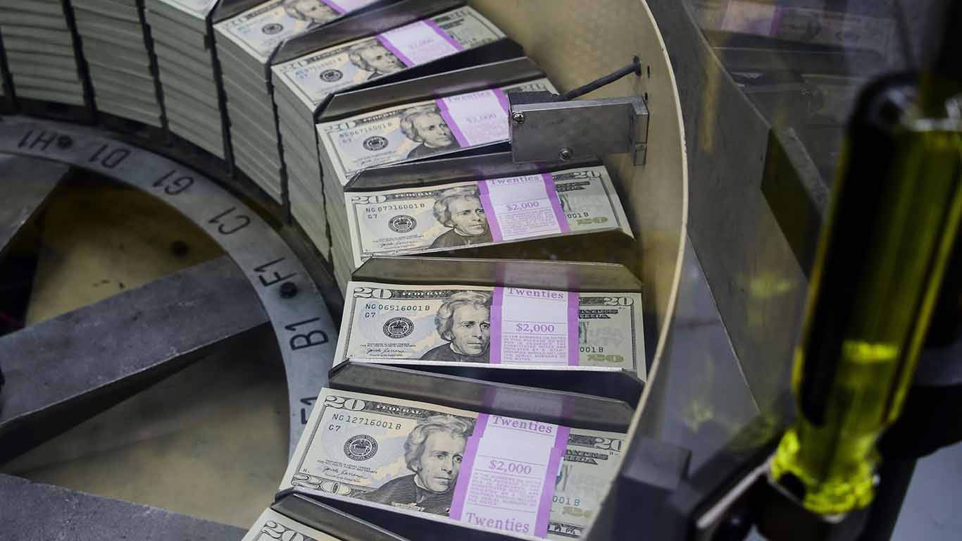 velasco117_ EVA HAMBACHAFP via Getty Images_printing money