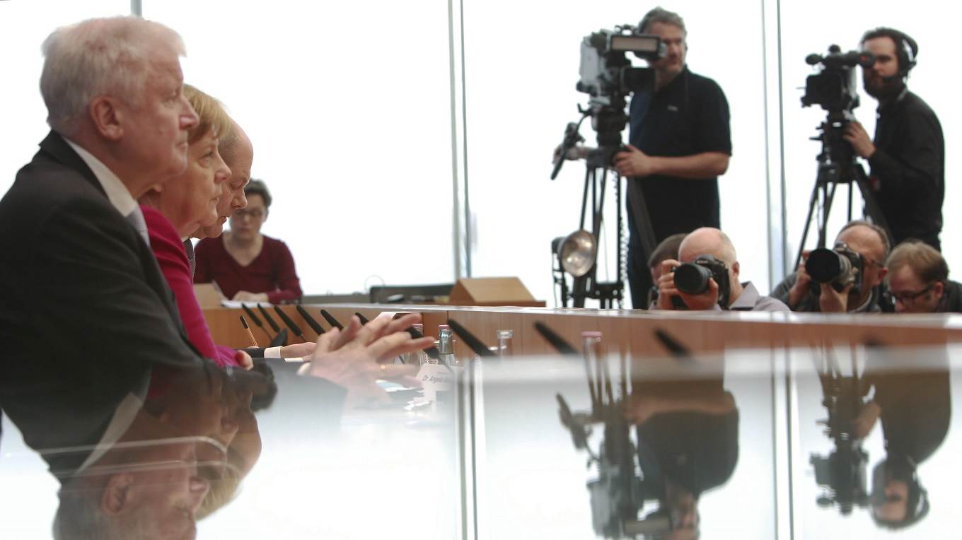 Angela Merkel, Acting Chairman of the SPD Olaf Scholz and Chairman of the Bavarian CSU Horst Seehofer 