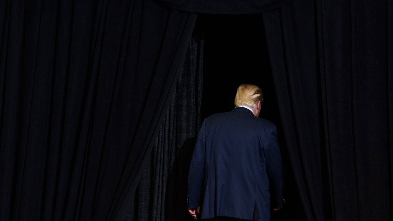 haass114_Justin MerrimanGetty Image_trumpwalkingawaycurtain