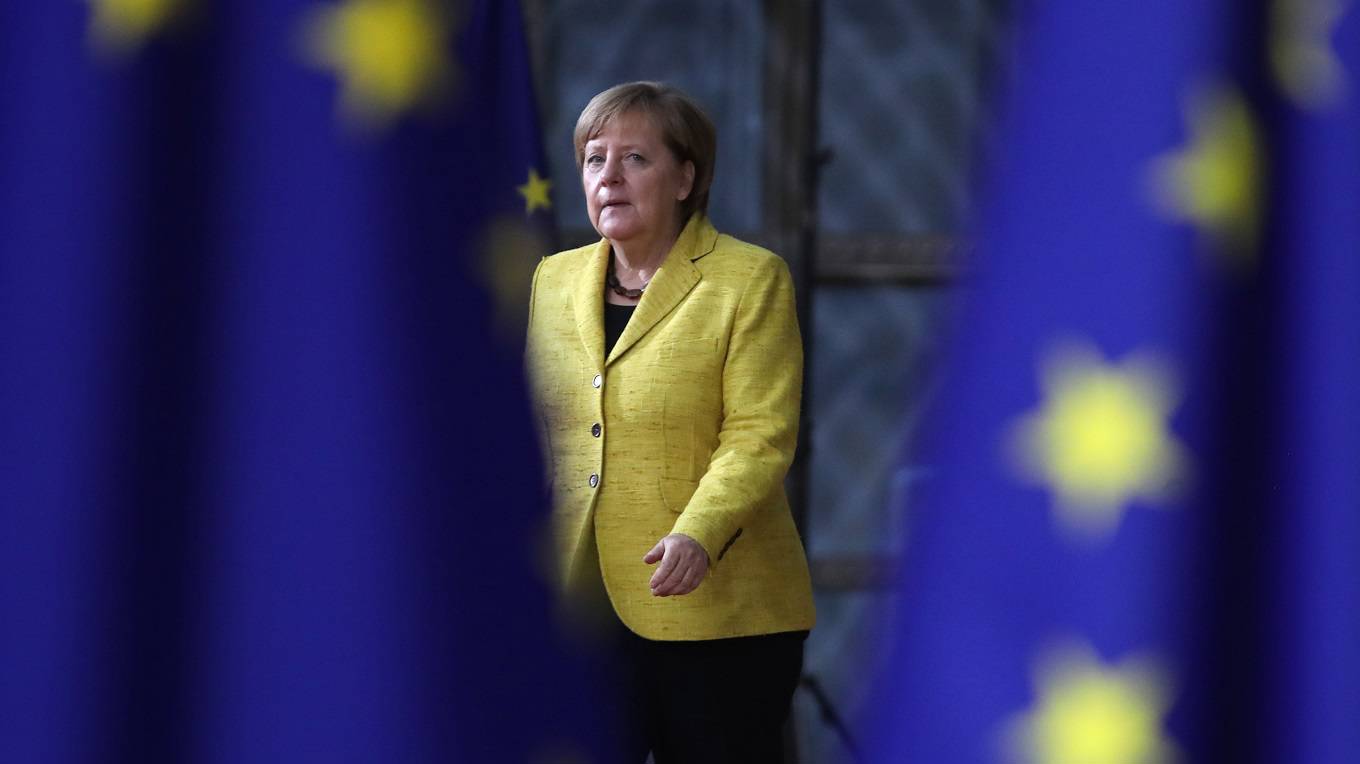 Angela Merkel arrives for the European Union leaders summit