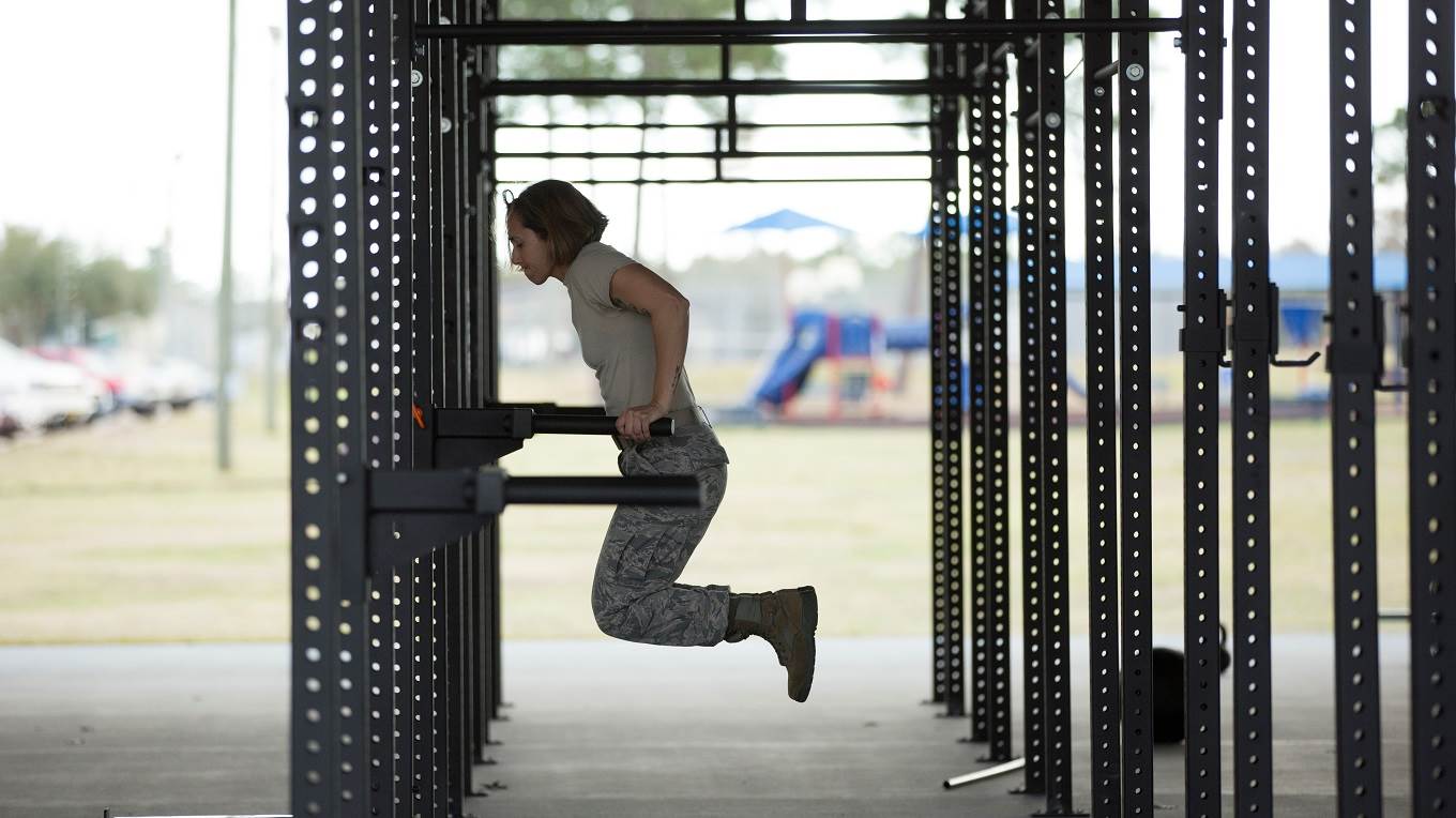 Female soldier push up training at military air force base