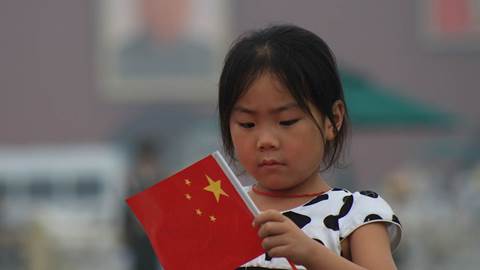 Chinese girl with flag
