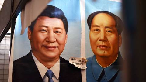 Painted portraits of Chinese President Xi Jinping and late communist leader Mao Zedong