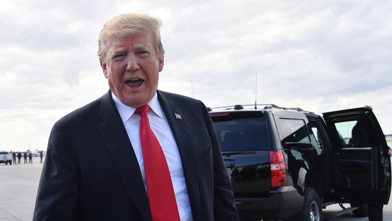 sachs307_NICHOLAS KAMMAFPGetty Images_trump speaking