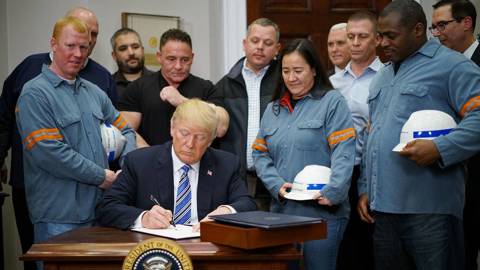 Donald Trump signs Section 232 Proclamations on Steel and Aluminum Imports in the Oval Office 