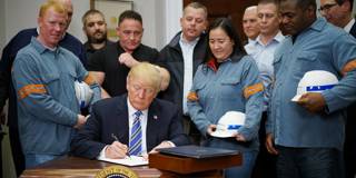Donald Trump signs Section 232 Proclamations on Steel and Aluminum Imports in the Oval Office 