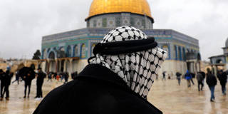 blair24_AHMAD GHARABLIAFP via Getty Images_palestinemanmosquejerusalemisrael