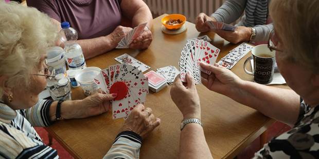 retirees play cards