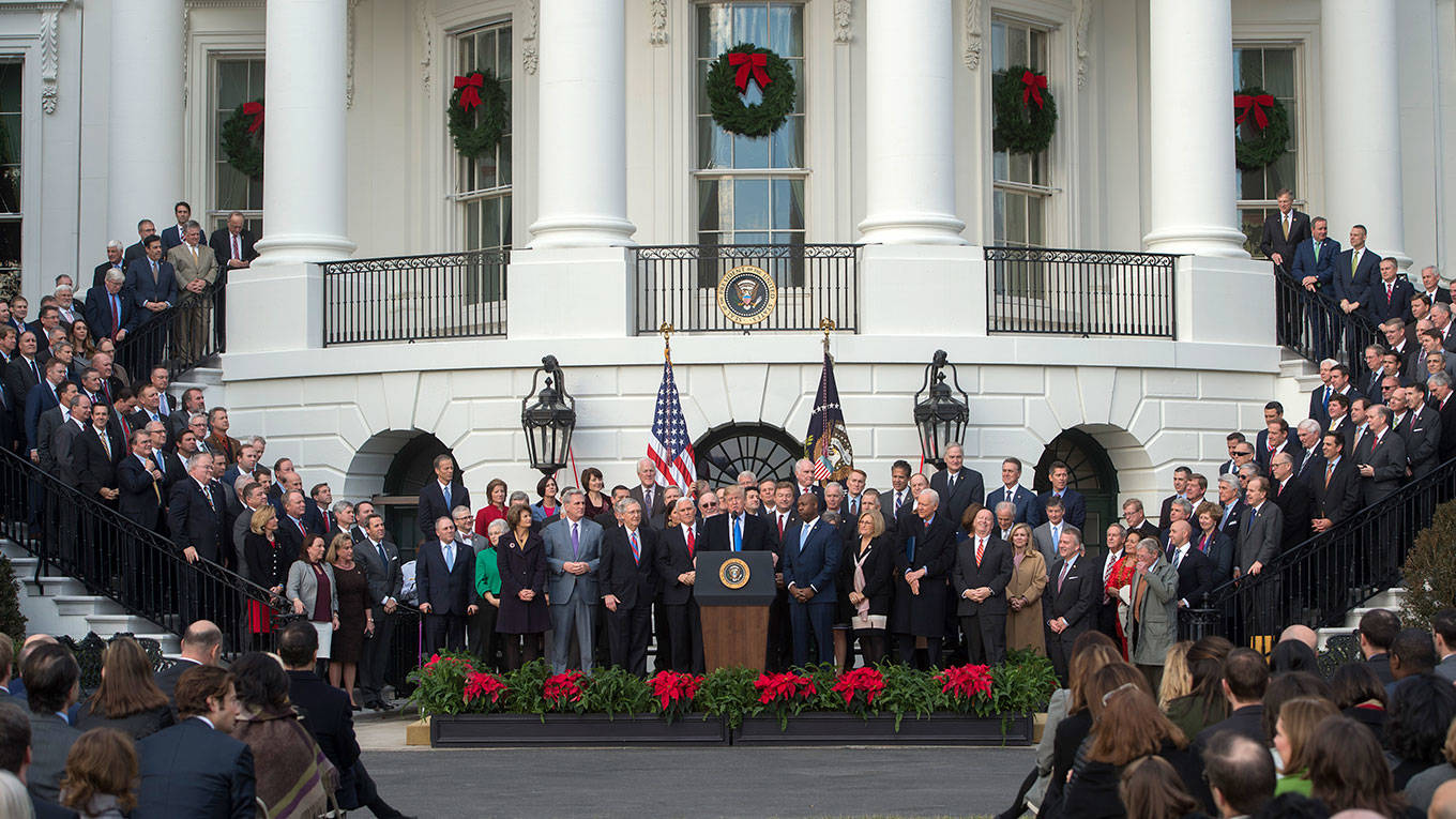 Donald Trump speaks about the passage of tax reform legislation