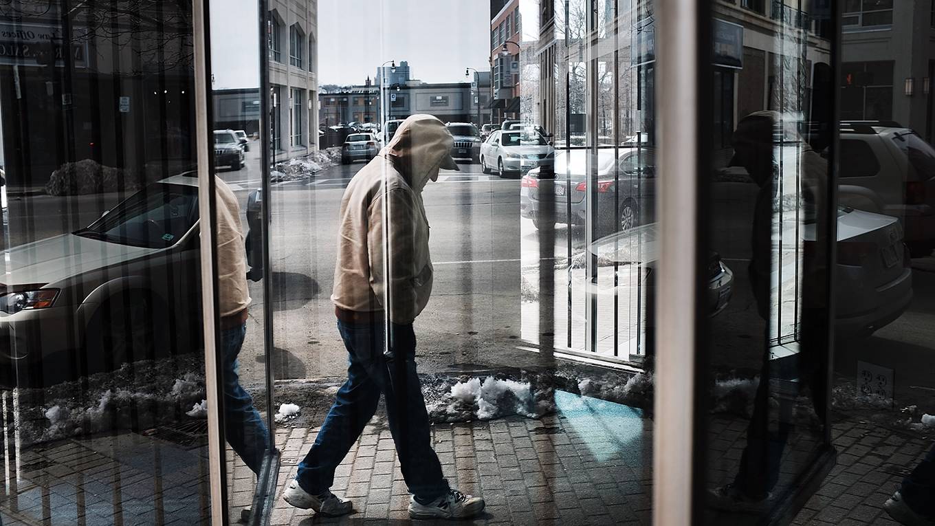 blanchet1_Spencer PlattGetty Images_sadmanwalkingbuildings
