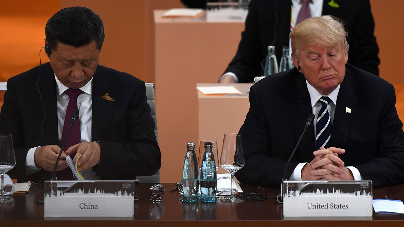 nye202_PATRIK STOLLARZAFP via Getty Images_trumpxisad