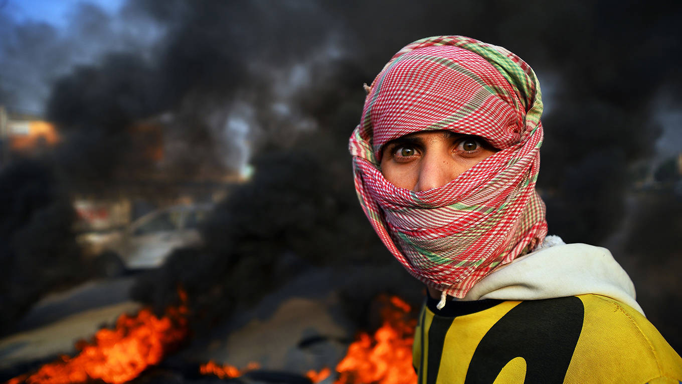 mahroum18_HAIDAR HAMDANIAFP via Getty Images_iraqprotestfire