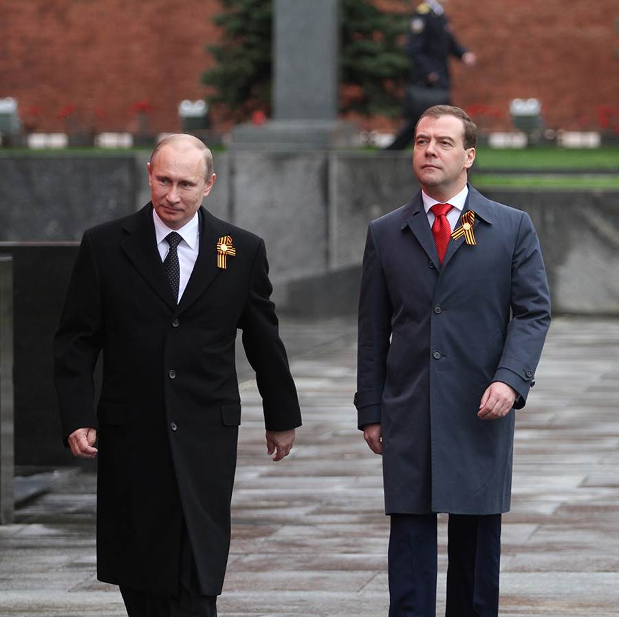 Putin walking with Mendvedev