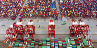 spence147_Ji HaixinVCG via Getty Images)_shippingcontainers