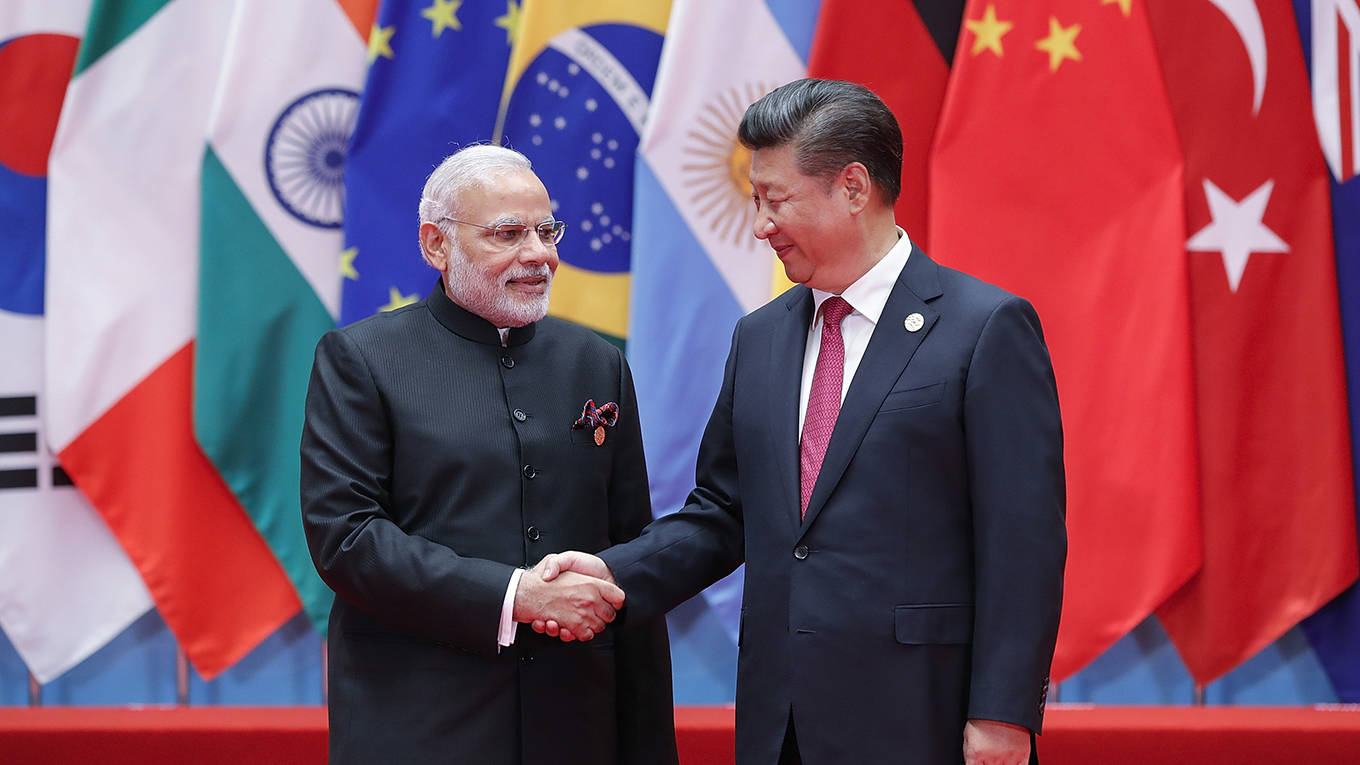 bardhan7_LintaoZhangGettyImages_xinpingmodishakehands