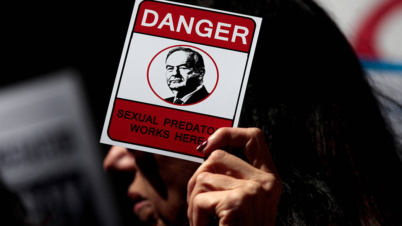 Demonstrators rally against Fox News television personality Bill O'Reilly