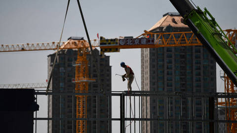 yu71_GREG BAKERAFP via Getty Images_chinaconstruction