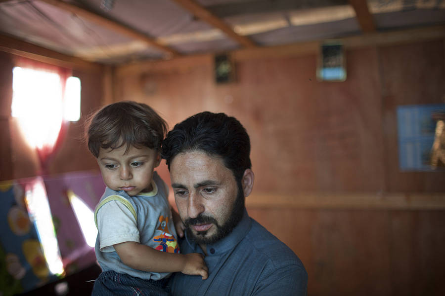 Syrian refugees, father and daughter