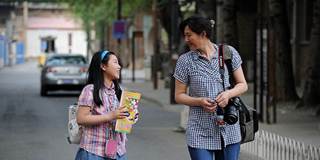 deaton4_AFP Stringer_ China lifestyle development Beijing family