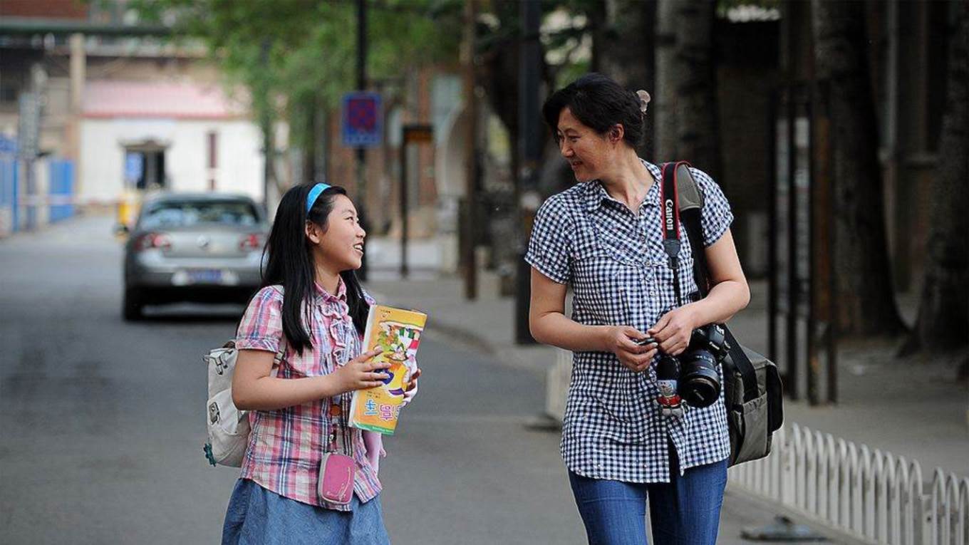 deaton4_AFP Stringer_ China lifestyle development Beijing family