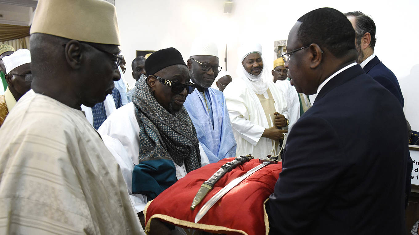 gaspard1_SEYLLOUAFP AFP via Getty Images_senegalpresidentsword