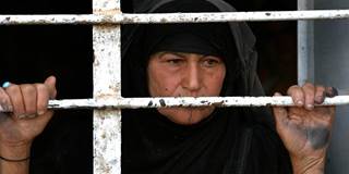 Iraqi woman looking downtrodden