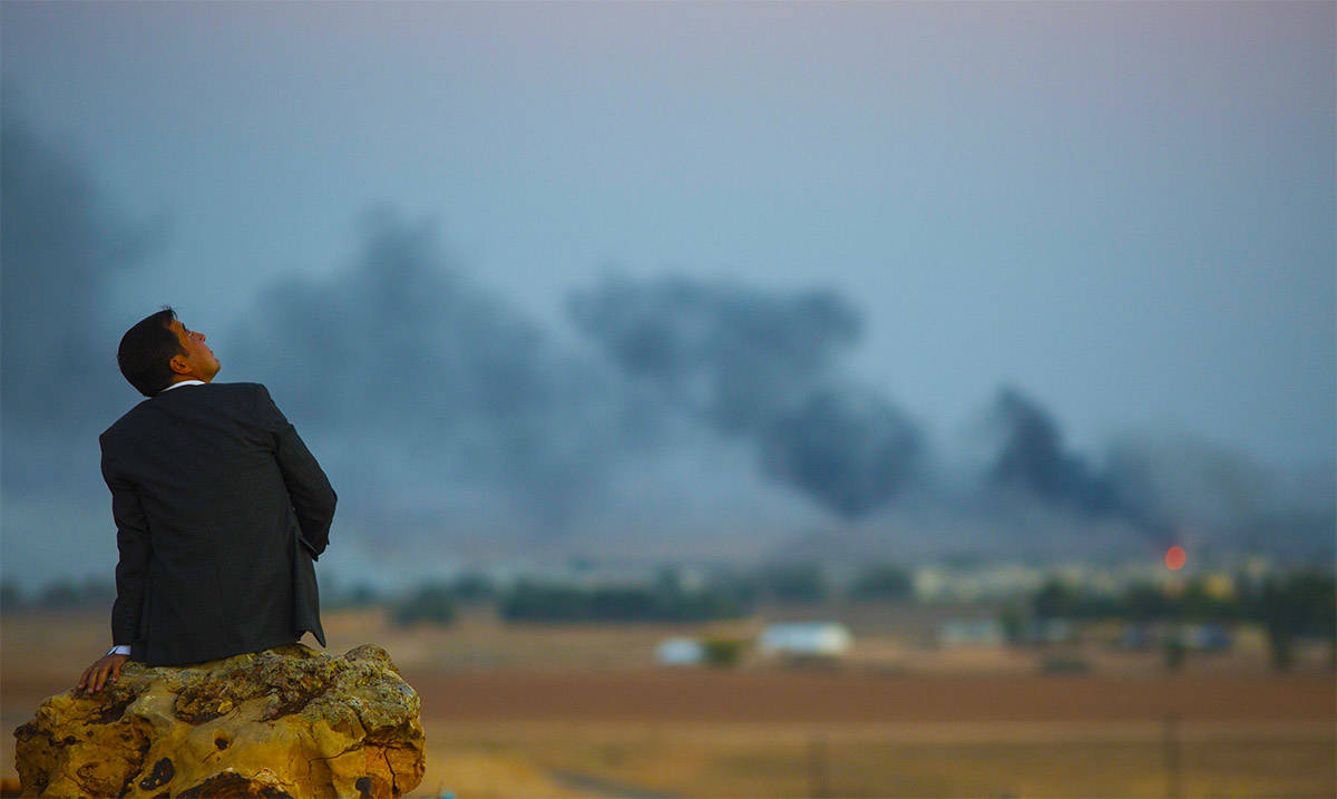 Man watches bombing campaign