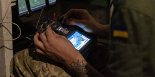 Ukrainian servicemen from the 116th Mechanized Brigade prepare interceptor drones designed to counter aerial threats during the war with Russia.