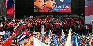Venezuelan President Nicolas Maduro attends a rally after submitting his presidential registration application 