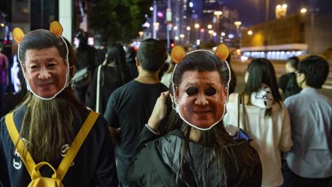 pei56_Miguel CandelaSOPA ImagesLightRocket via Getty Images_xijinpinghongkongprotestmasks