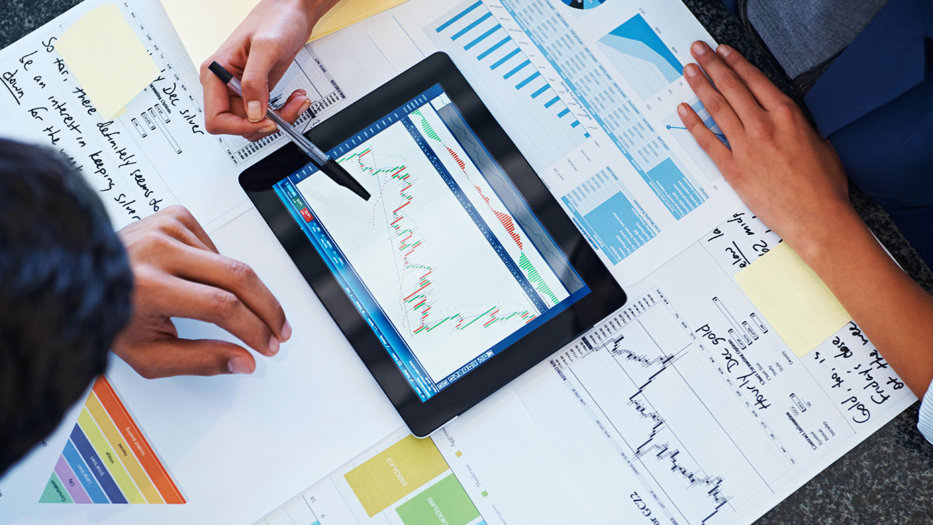A tablet and charts