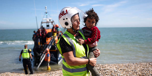 brown104_HENRY NICHOLLSAFP via Getty Images_UKrefugees