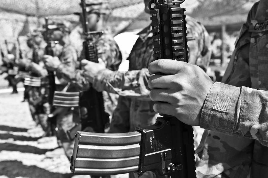 Military holding firearms