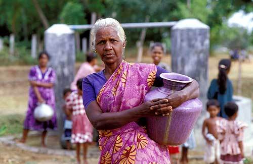 Woman collecting water