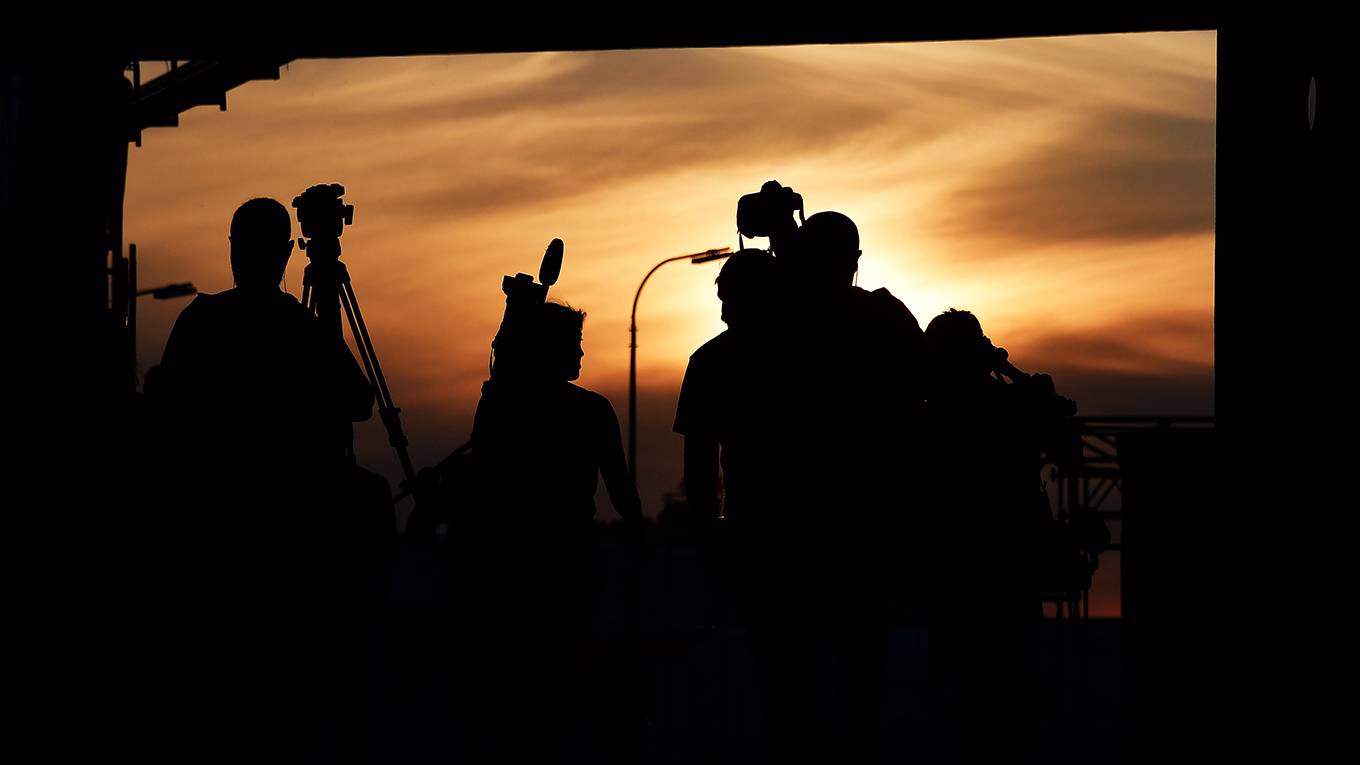 mmnelson1_JOE KLAMARAFP via Getty Images_journalistsilhouettes