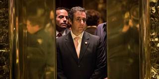 Michael Cohen gets into an elevator at Trump Tower
