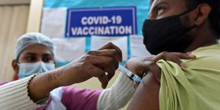 sgaier2_SAJJAD HUSSAINAFP via Getty Images_india vaccination covid
