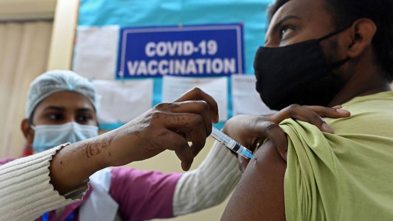 sgaier2_SAJJAD HUSSAINAFP via Getty Images_india vaccination covid
