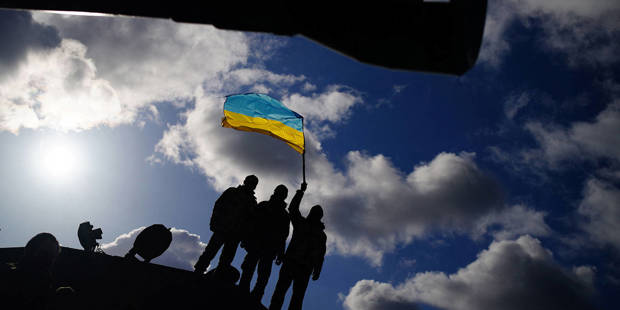 deryugina1_BEN BIRCHALLPOOLAFP via Getty Images_ukraineflagsoldier