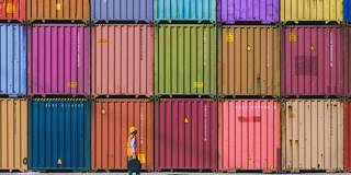 wei19_GettyImages_workercolorfulcontainers